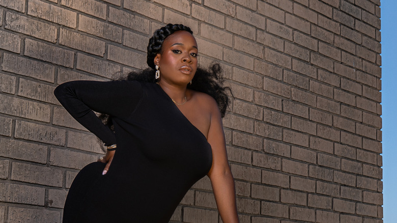 Bria Henderson in a black dress