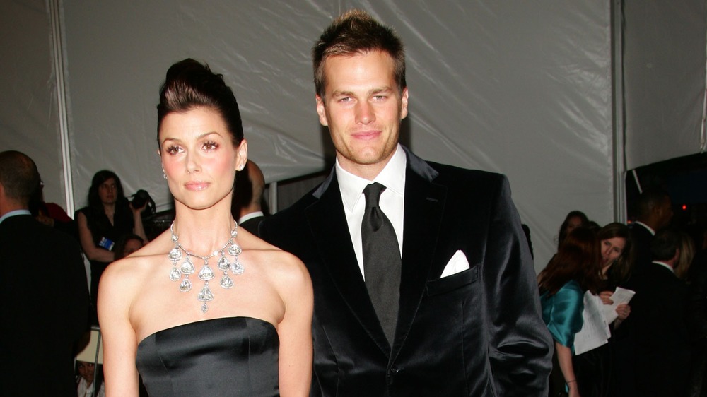 Bridget Moynahan in black strapless gown and Tom Brady in black jacket and tie