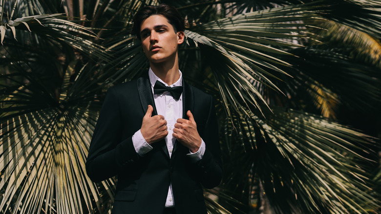 man posing in classic tuxedo
