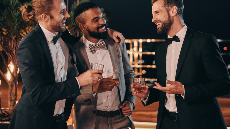 men in suits at event