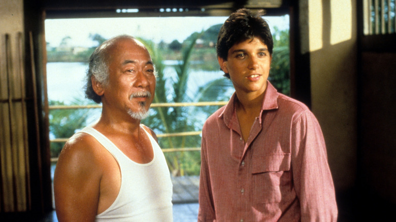 Pat Morita and Ralph Macchio in The Karate Kid