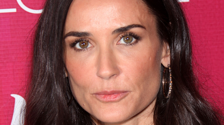 Demi Moore poses at an event. 