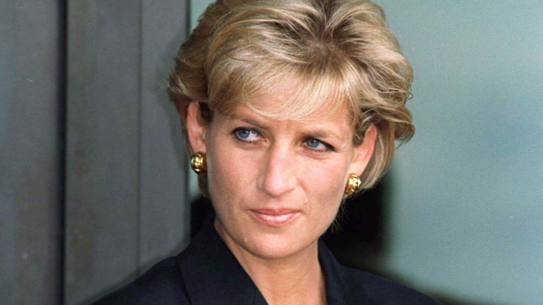Princess Diana looks away from the camera