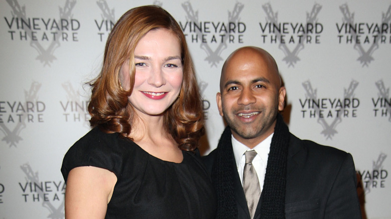 Heather Burns and Ajay Naidu smiling at event