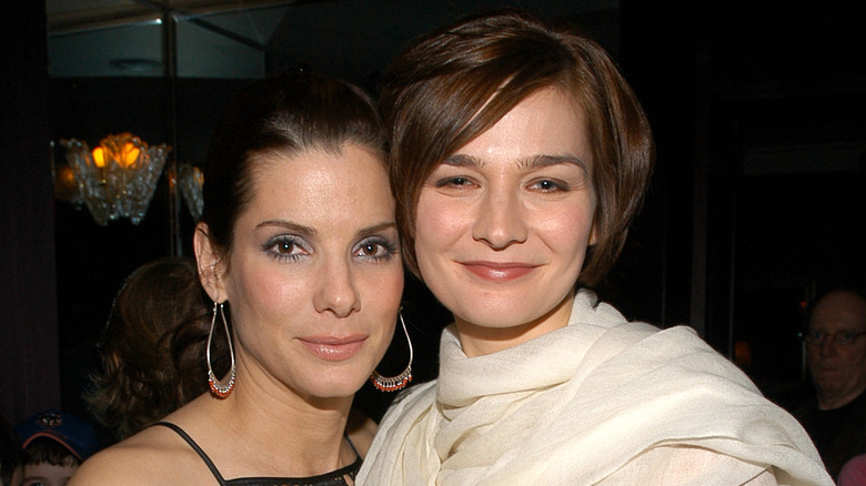 Sandra Bullock and Heather Burns smiling