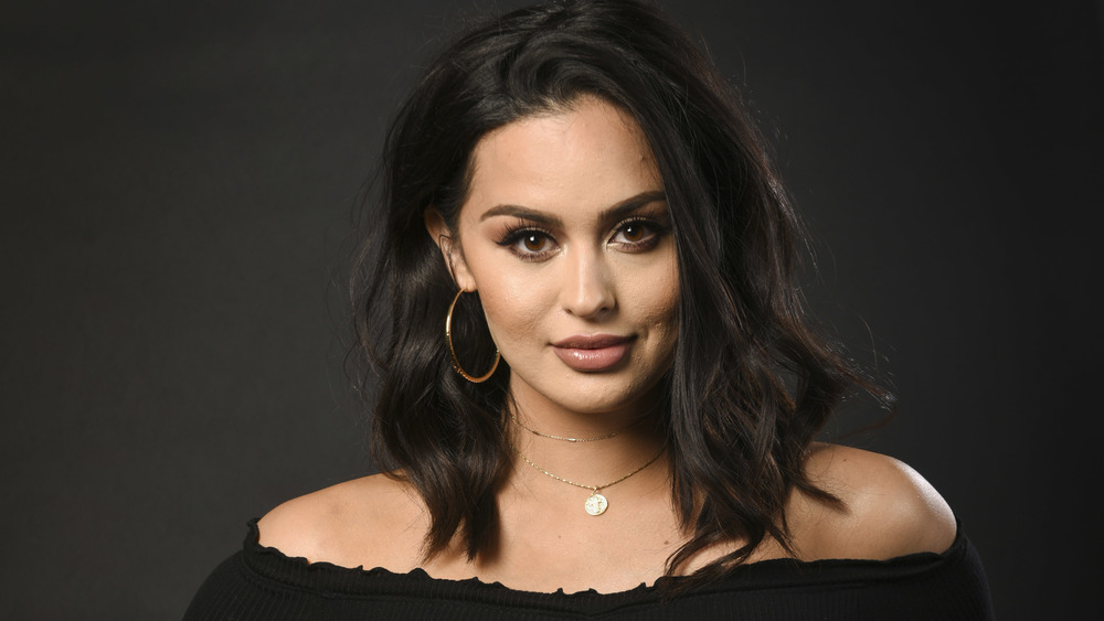 Christen Dominique wearing hoops