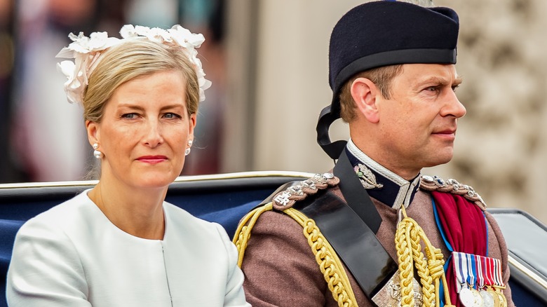 Duchess Sophie and Prince Edward ride in a royal carriage