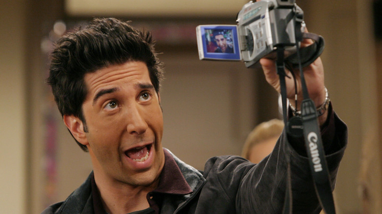 David Schwimmer holding camera