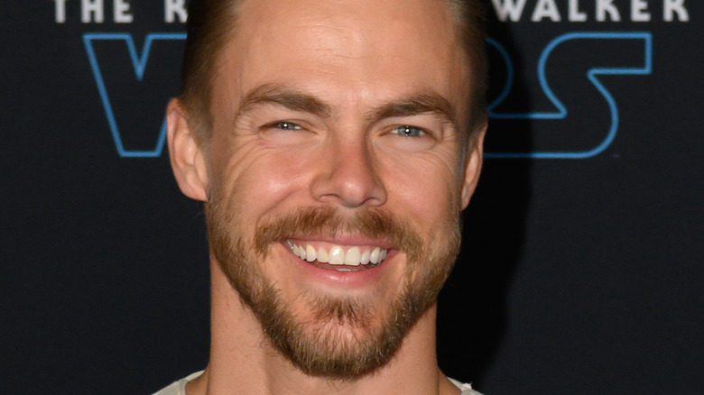 Derek Hough smiling with beard