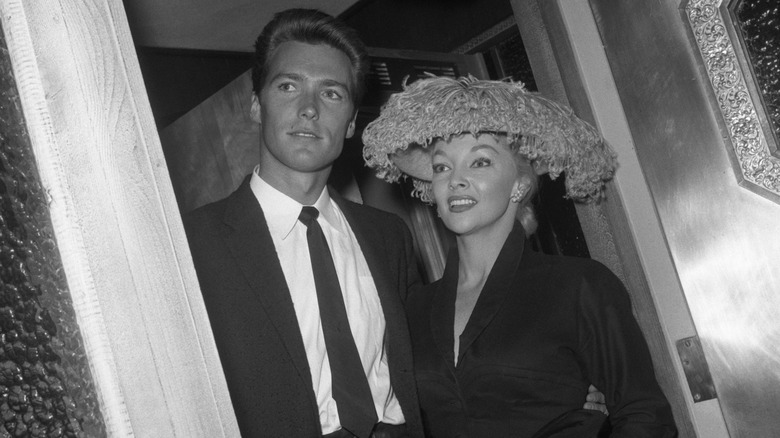 A young Clint Eastwood and Mari Blanchard pose for photographers at Hollywood event circa 1956 when he was a contact player at Universal Studios.