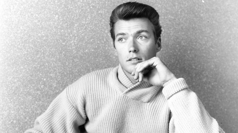 Clint Eastwood drinks a cup of coffee at home on June 1, 1956 in Los Angeles, California.