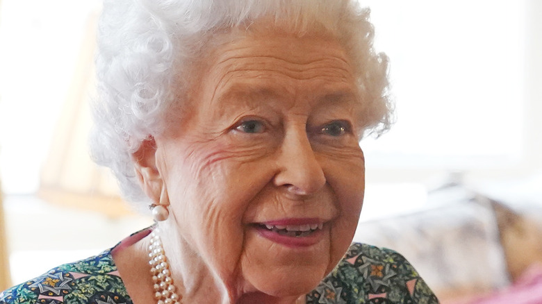 Queen Elizabeth smiles