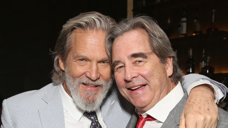 Jeff Bridges and Beau Bridges smiling together.