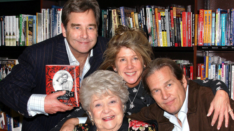 Beau Bridges, Lucinda Bridges, and Jeff Bridges gathering around their mother Dorothy Bridges at a bookstore event.
