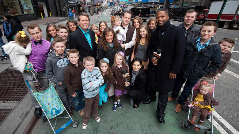 Duggar family posing in Time Square