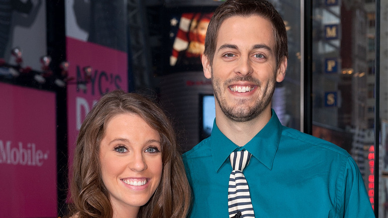 Jill Duggar Dillard and Derick Dillard pose at an event together