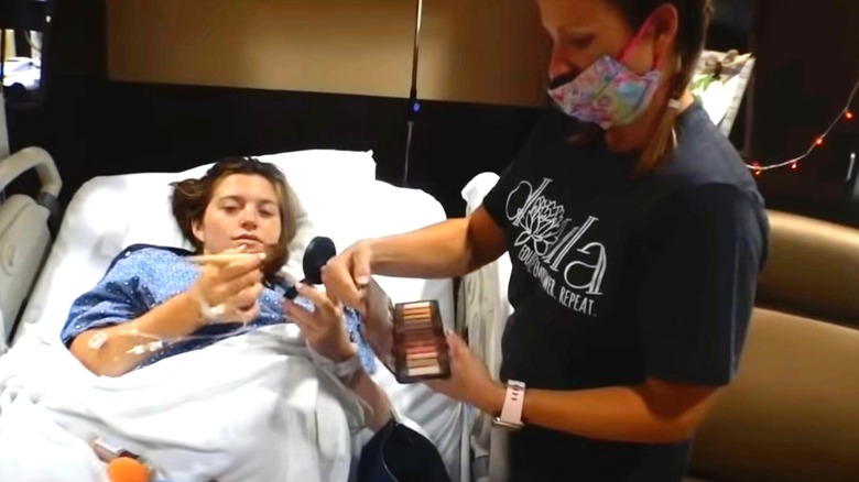 Joy-Anna Duggar Forsyth in labor applying makeup