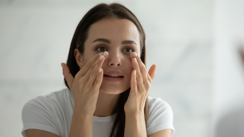 Woman practicing skin care