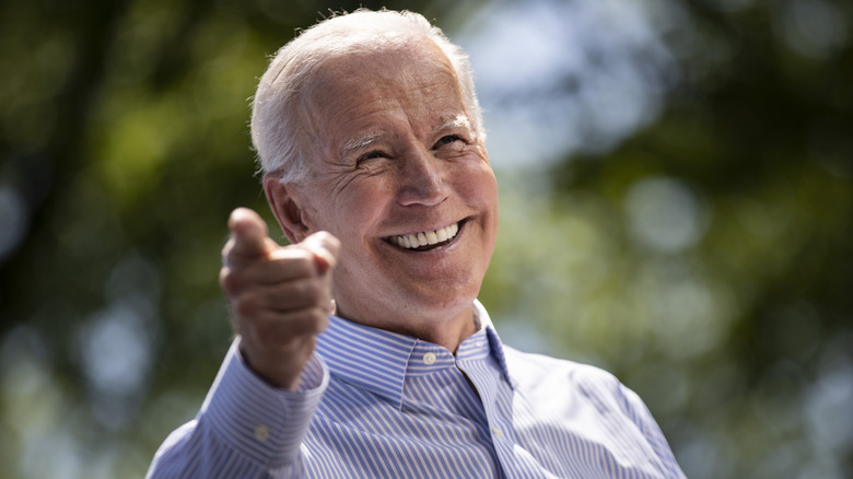 President Joe Biden pointing and smiling