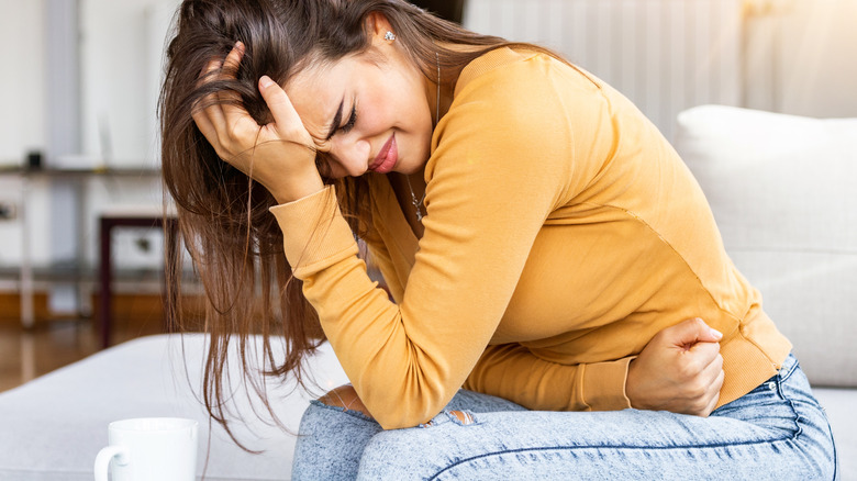 Woman experiencing cramping