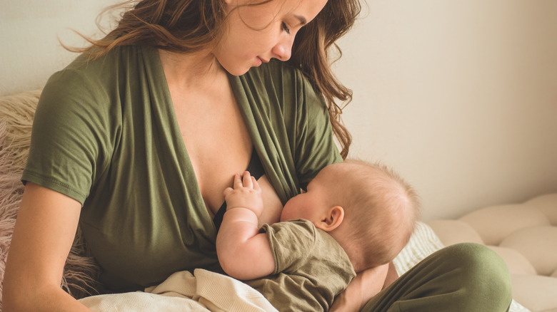 Woman breastfeeding her baby
