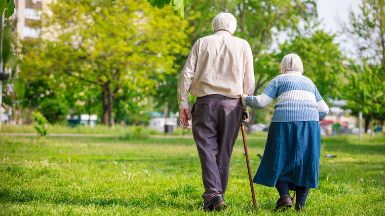 Elderly couple with dowager's hump