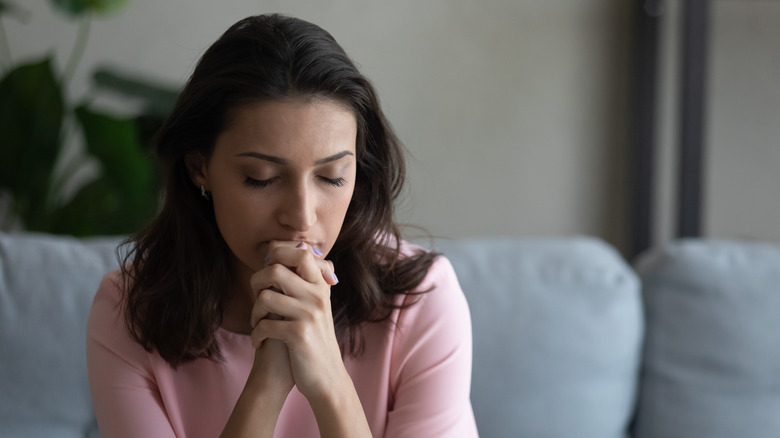 Woman struggling to concentrate 