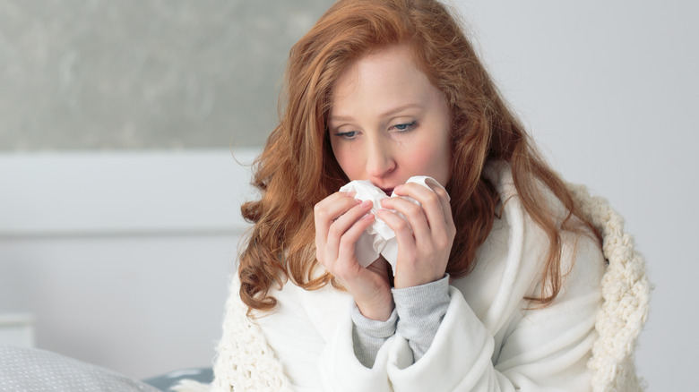 Woman with a runny nose