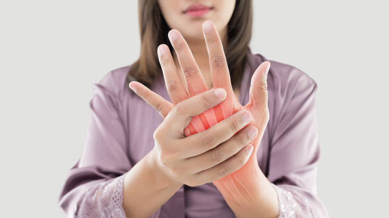 Woman with hand pain 
