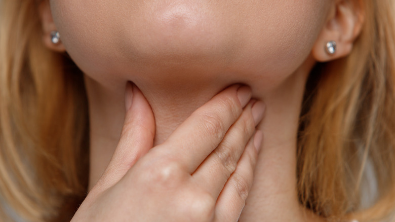 Woman with painful tonsils