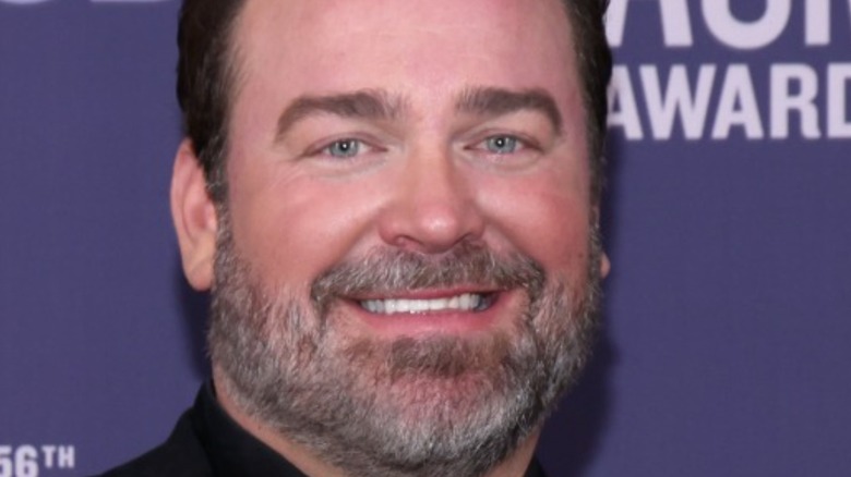 Lee Brice smiling with beard