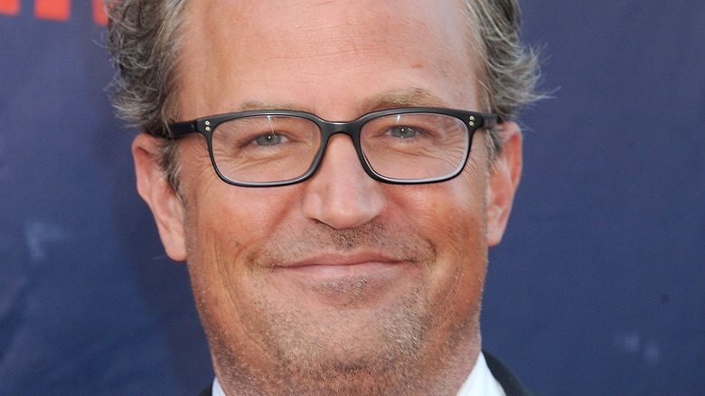 Matthew Perry wearing glasses