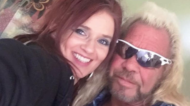 Dog the Bounty Hunter and Moon Angell pose for selfie