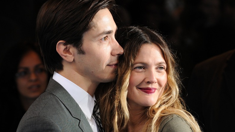 Drew Barrymore and Justin Long nuzzled up together on a red carpet in 2010