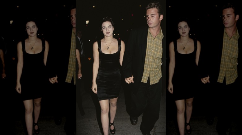 Drew Barrymore and Jamie Walters at a movie premiere in 1992