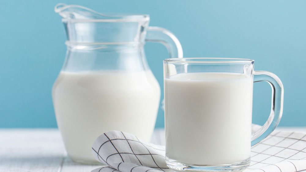 Milk sitting on a table