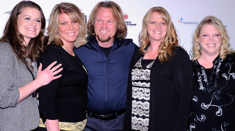 Kody Brown and his wives, all smiling