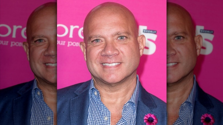 Eric Eremita against pink backdrop