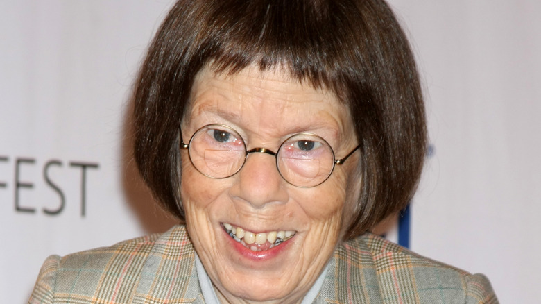 Linda Hunt smiles on the red carpet