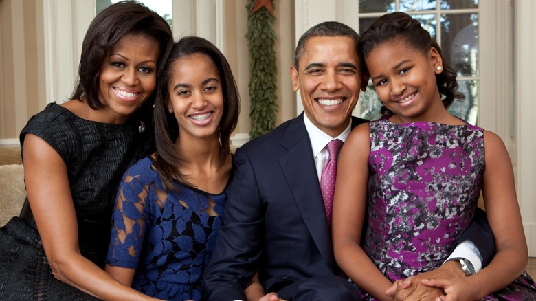 (L-R) Michelle Obama, Malia Obama, Barack Obama, and Sasha Obama pose for a family portrait