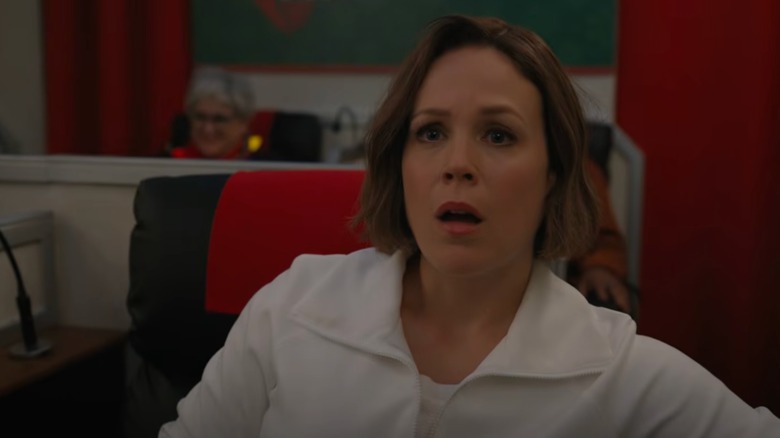 Ella (Erin Krakow) looking shocked in Christmas Above the Clouds