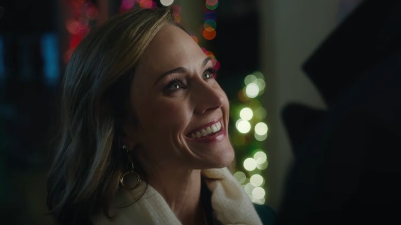 Gentry (Nikki DeLoach) smiling in A Grand Ole Opry Christmas