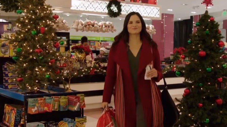 Katrina Law looking satisfied as Anna in 12 Gifts of Christmas