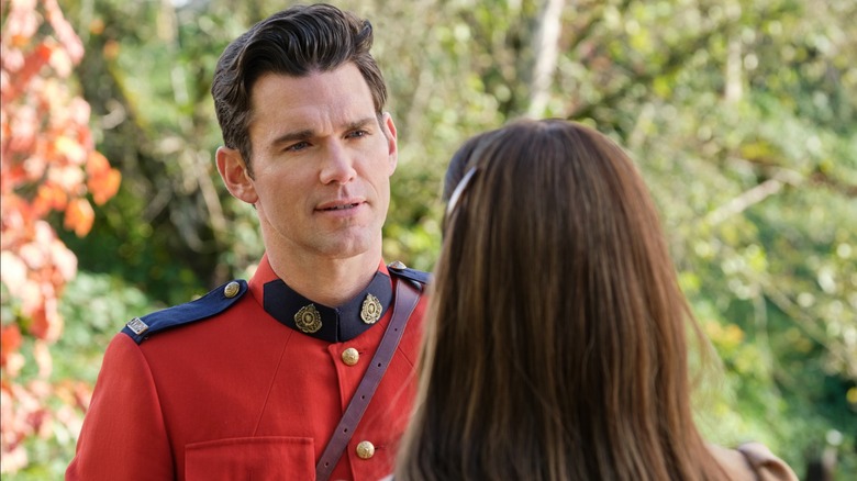 Kevin McGarry talking to Erin Krakow in "When Calls the Heart"