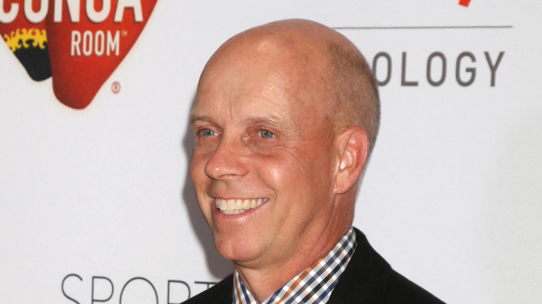 Scott Hamilton smiling at an event in 2016