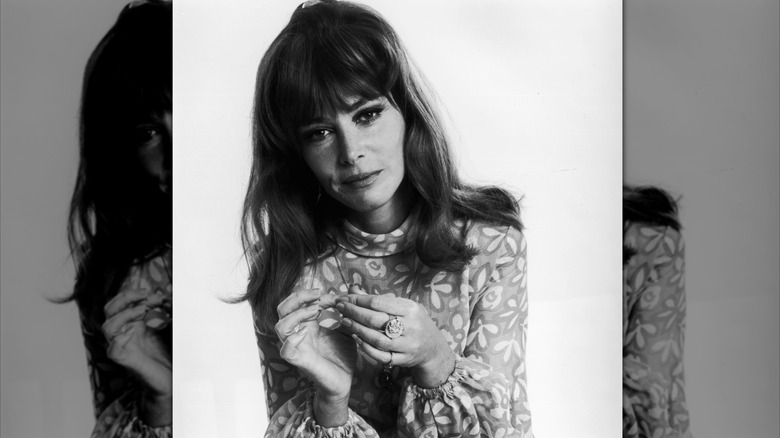 Lee Grant posing with a sunflower for a publicity photo in 1970.