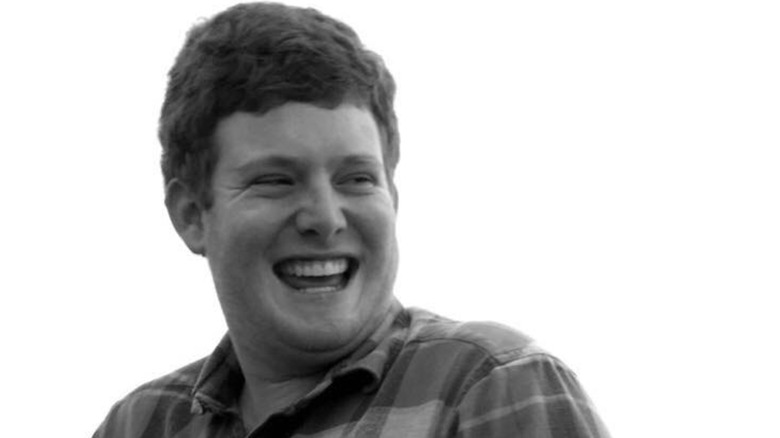 Black and white image of Buster Murdaugh laughing