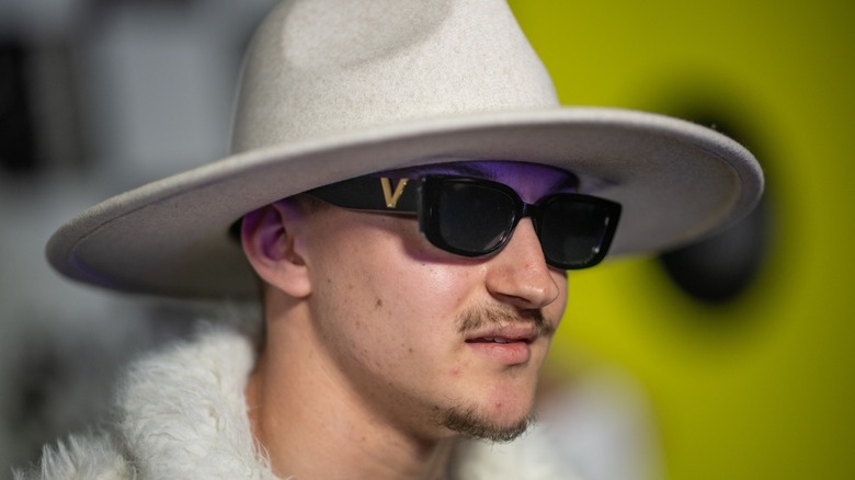 The Backpack Kid (Russell Horning) wearing a hat and sunglasses in 2024