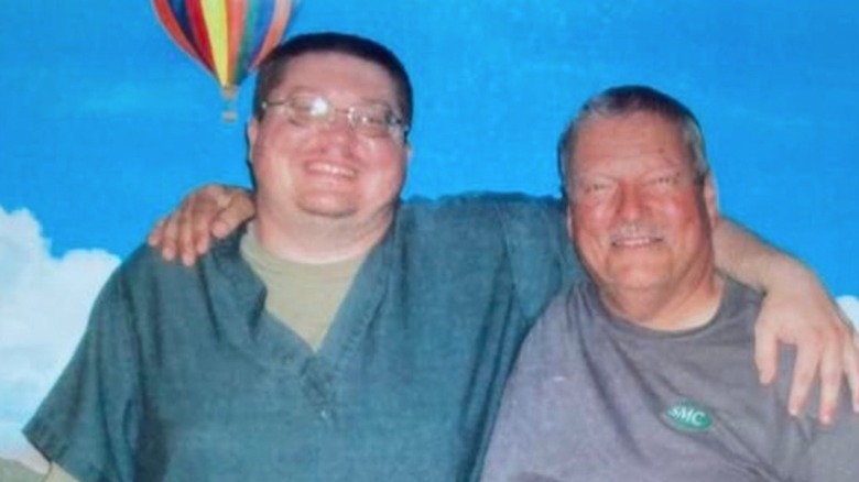 Brendan Dassey posing with his father in prison