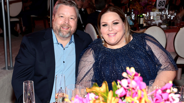 Chrissy Metz and Bradley Collins smiling at a charity dinner.